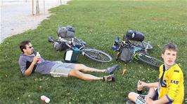 Tao and Joe take a rest at Place d'Armes, Cully, 58.4 miles into the ride